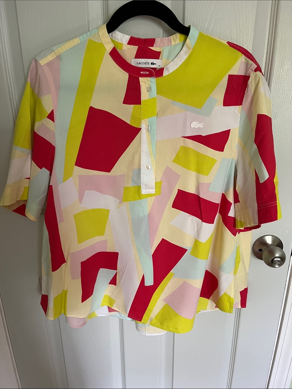 Lacoste Women’s Abstract Geo Print Short Sleeve Top in Yellow, Pink & Red